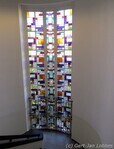 Overloop met glas in lood en hekwerk (hekwerk van later datum?).
<br/>
Gert-Jan Lobbes, 2016